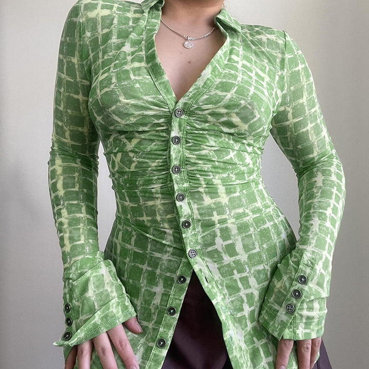 Ladies fitted blouse with sophisticated ruffle design and elegant button closure