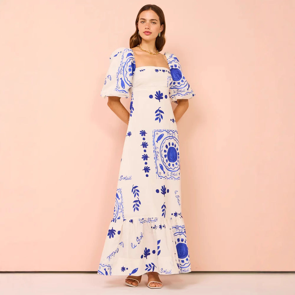 Ladies maxi dress with elegant puff sleeves and floral accents Lune London