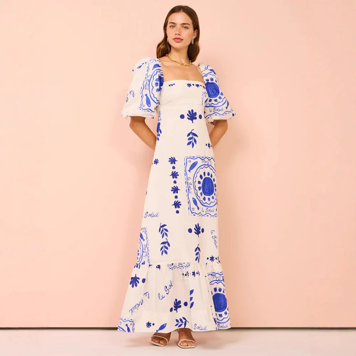 Ladies maxi dress with elegant puff sleeves and floral accents Lune London