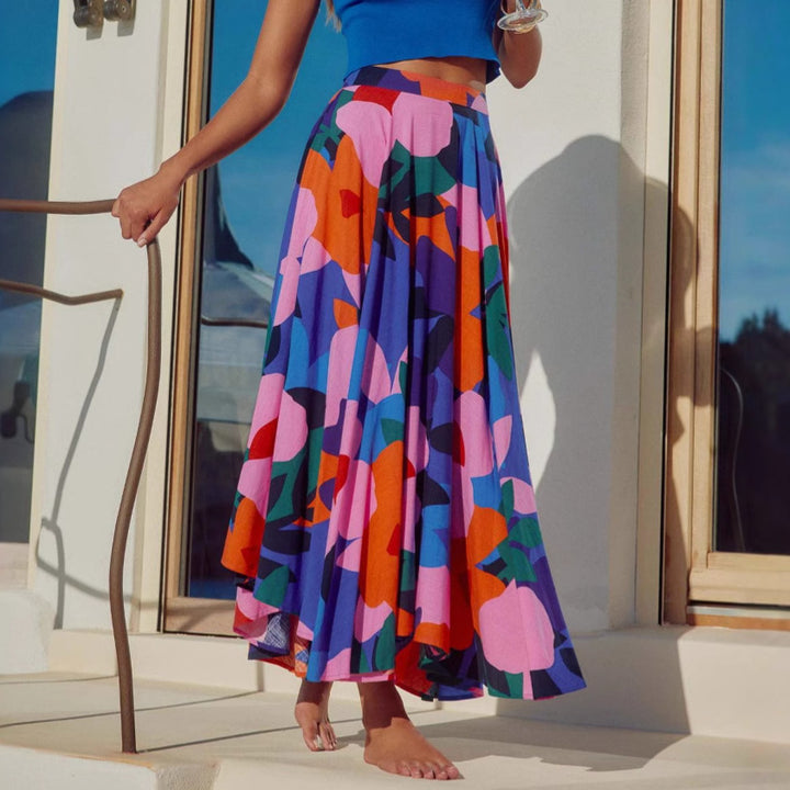 Women's maxi skirt with colorful floral design and flowing fall