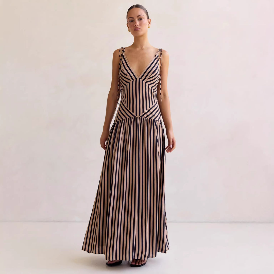 Women's maxi dress with deep V-neckline and elegant striped design
