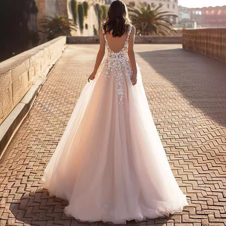Ladies wedding dress with exquisite floral appliqués and deep V-neck Lisslune
