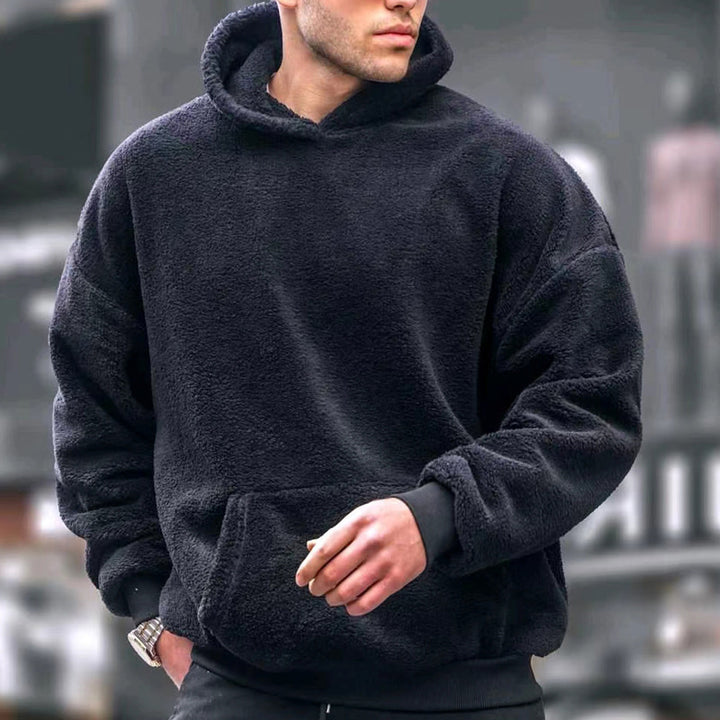 Men's oversized fleece pullover with practical pockets and hood Lisslune