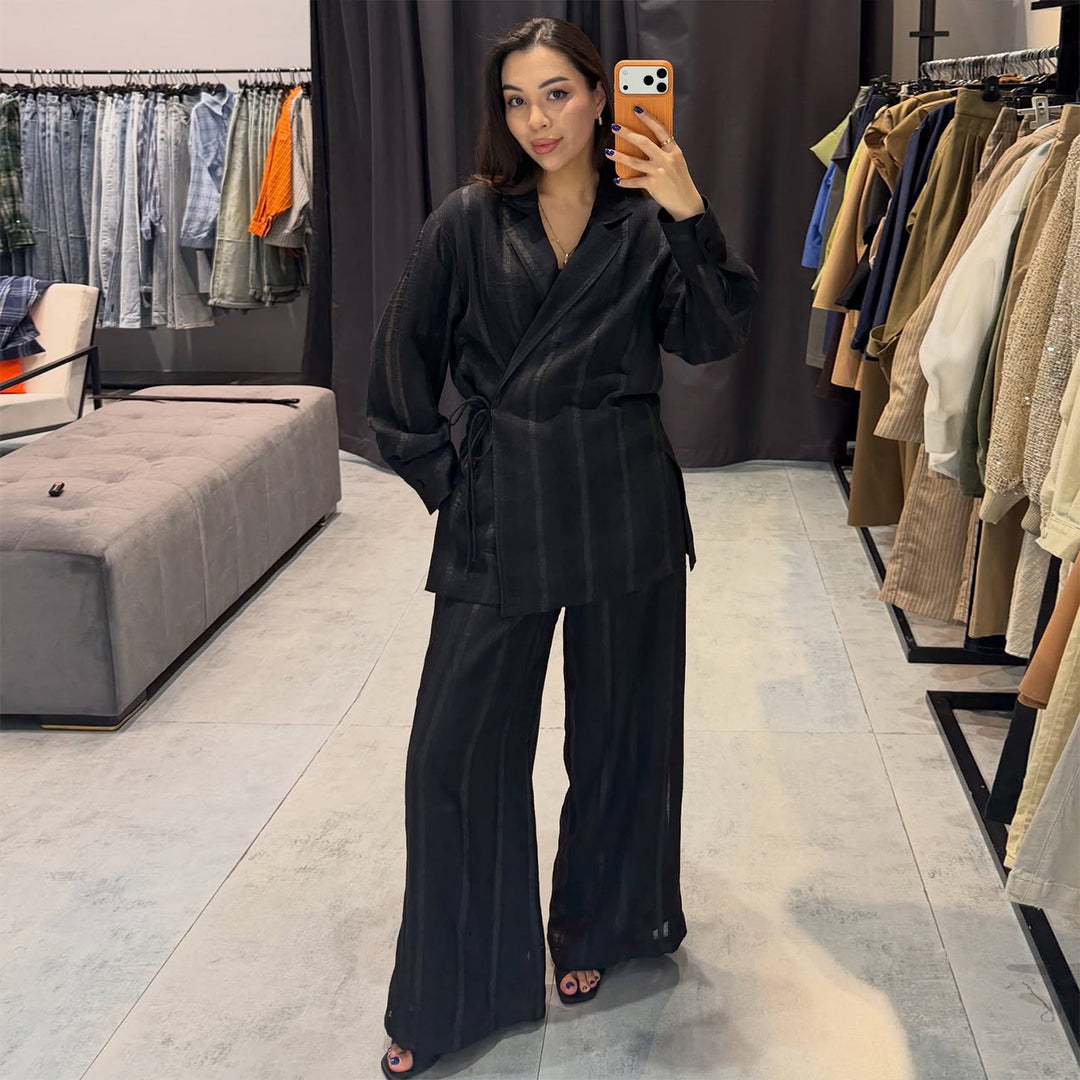 Women's set of stylish oversized blazer and wide-cut trousers