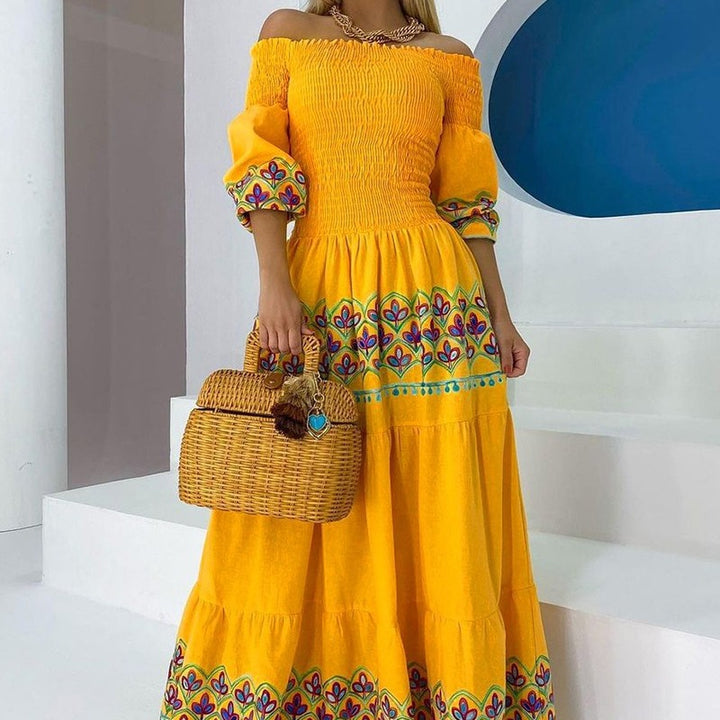 Women's Boho Maxi Dress with Off-the-Shoulder Design and Playful Embroidery Detail