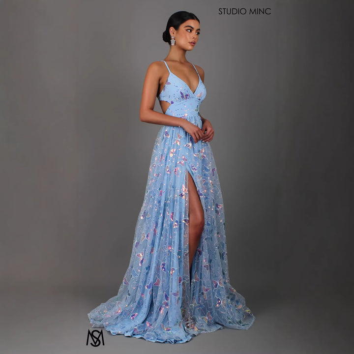 Ladies maxi dress with delicate glitter accents and floral cut