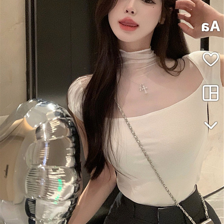Women's fitted top with transparent mesh inserts and elegant stand-up collar