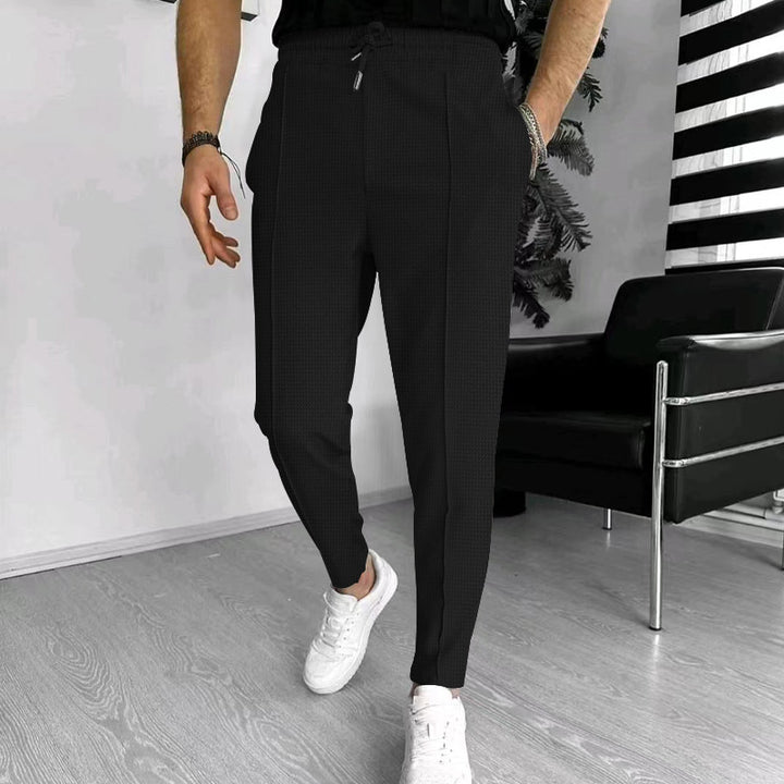 Men's jogging pants with side zipper pockets and modern cut Lisslune