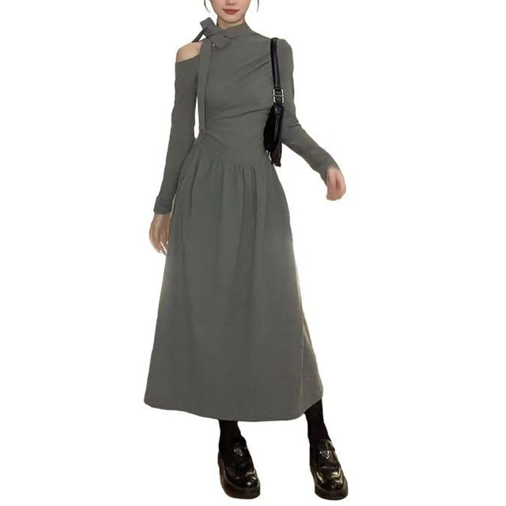 Women's dress with asymmetric neckline and elegant bow design