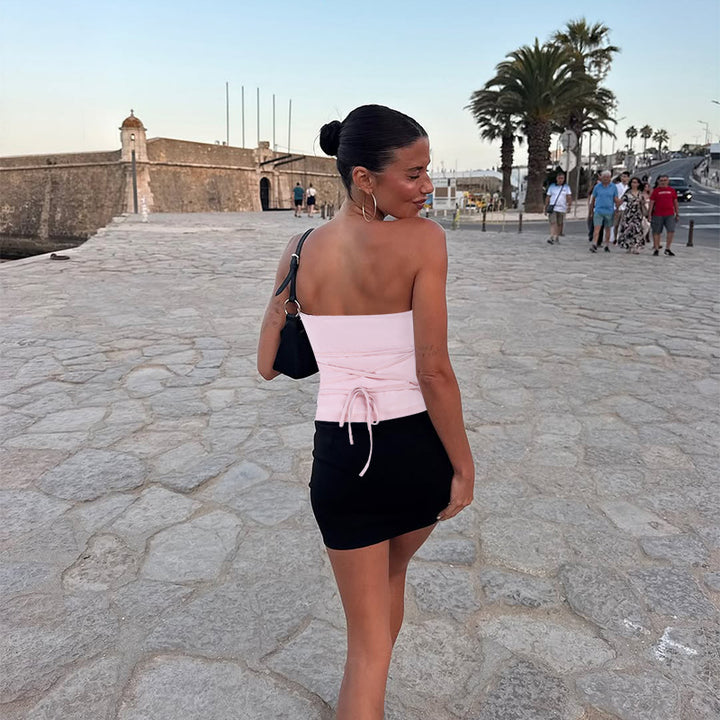Women's corset top with elegant zip design and fitted silhouette