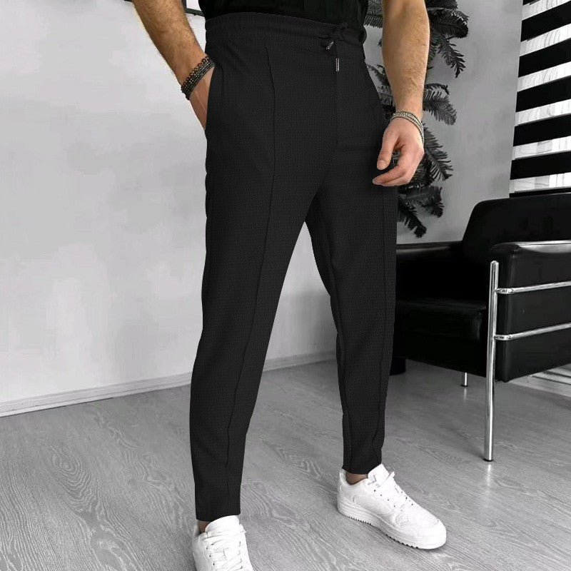 Men's stylish high-waisted pants with elastic drawstring and textured design Lisslune