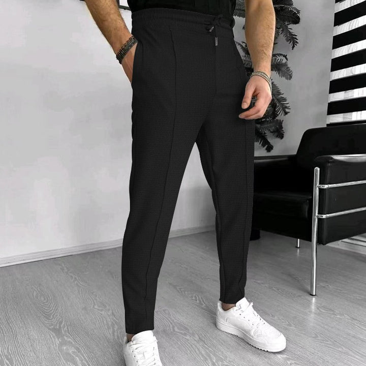 Men's stylish high-waisted pants with elastic drawstring and textured design Lisslune
