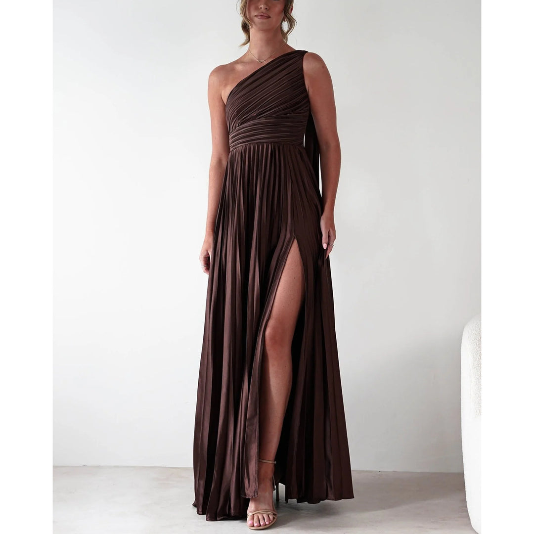 Ladies evening dress with elegant pleated skirt and asymmetric top