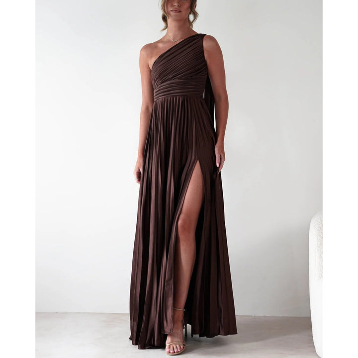 Ladies evening dress with elegant pleated skirt and asymmetric top