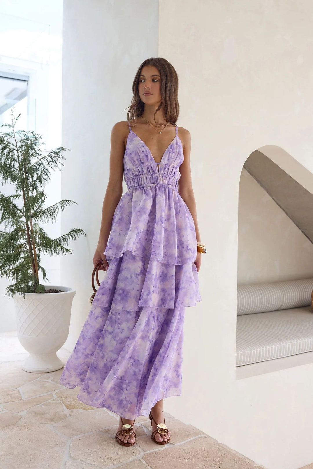 Women’s maxi dress with voluminous ruffle layers and V-neck