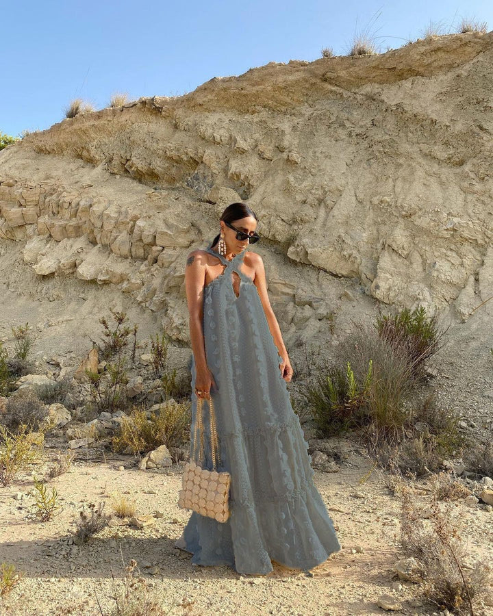 Women's maxi dress with playful ruffle details and floral pattern