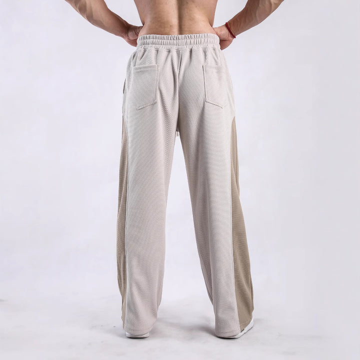 Men's sporty leisure pants with side ventilation openings and elastic waistband Lisslune