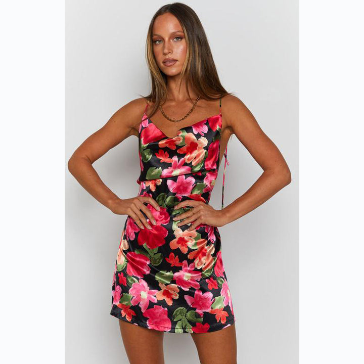 Women’s form-fitting dress with floral design and attractive cut