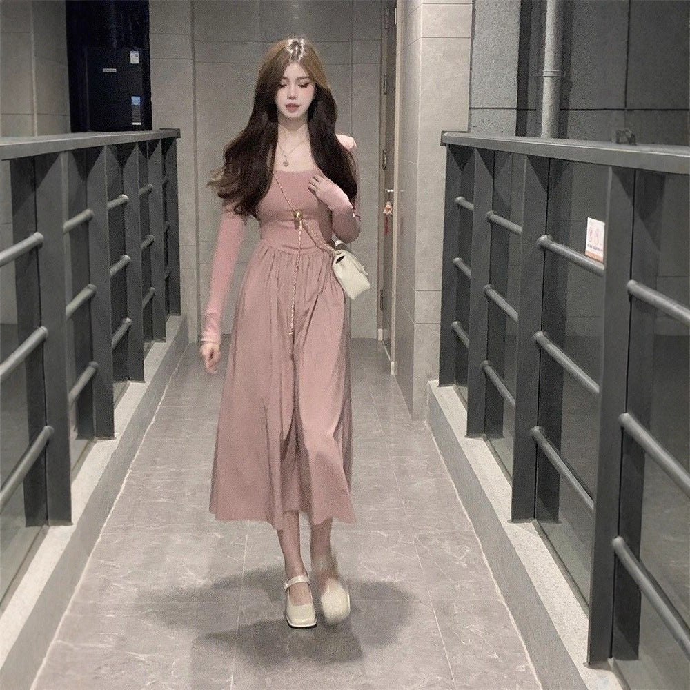 Women long-sleeved midi dress with flared skirt and decorative puff sleeves