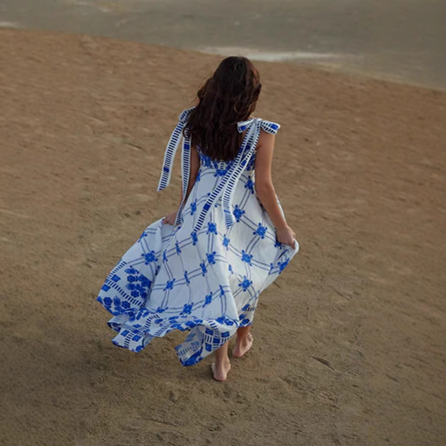 Women's maxi dress with playful check pattern and innovative strap details