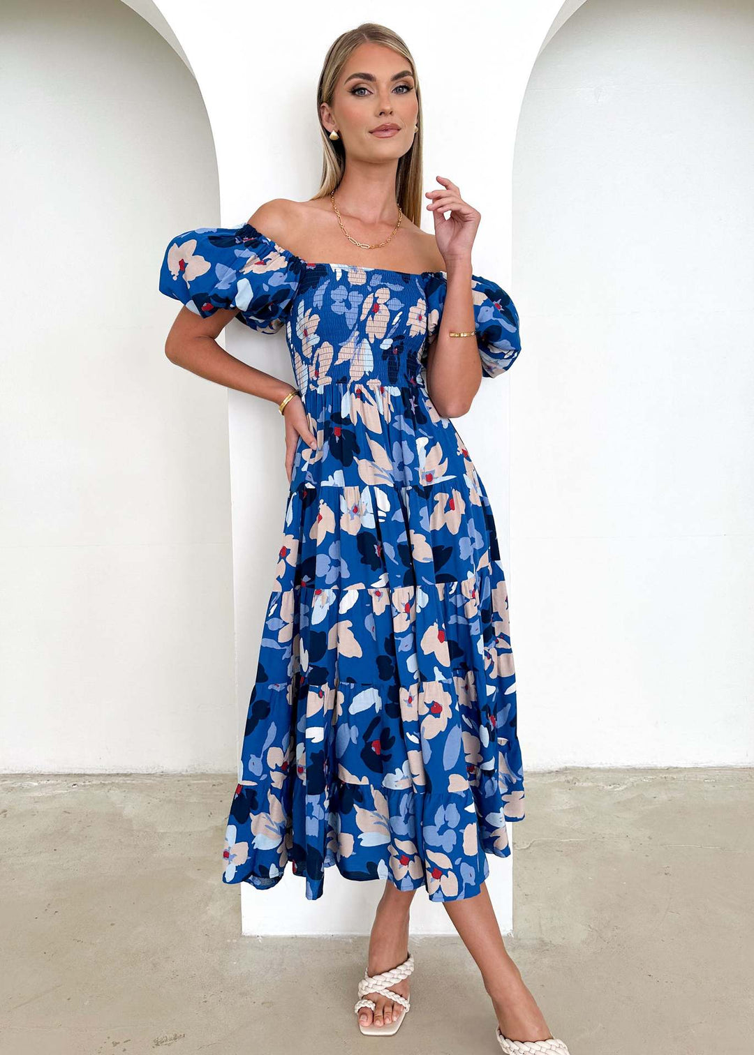 Women's maxi dress with puff sleeves and floral smocking