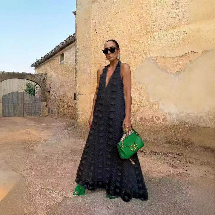 Women's maxi dress with 3D textures and deep V-neck