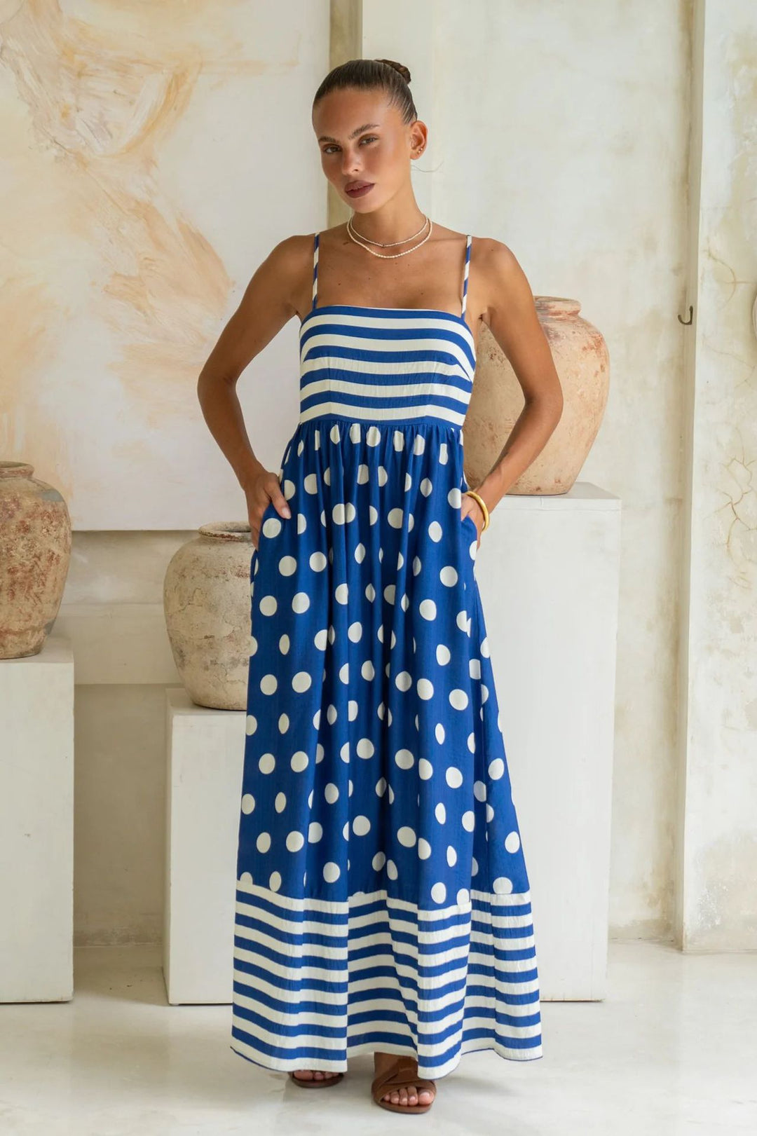 Women's maxi dress with gathered bodice and playful polka dot and stripe pattern Lune London