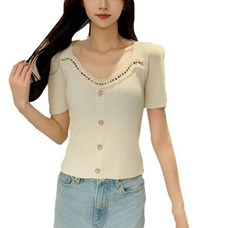 Women's fitted top with decorative button placket and fashionable V-neck