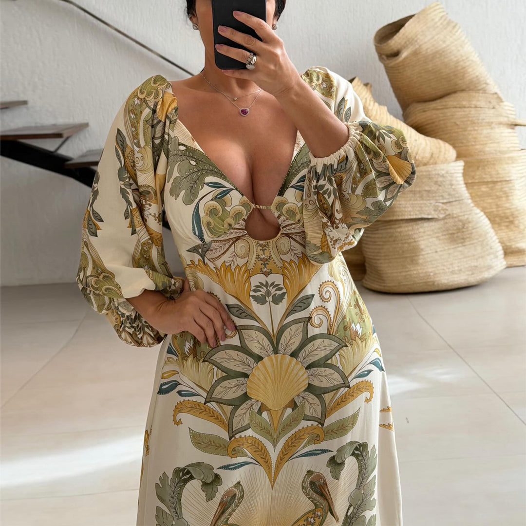 Ladies maxi dress with intricate floral design and deep V-neck
