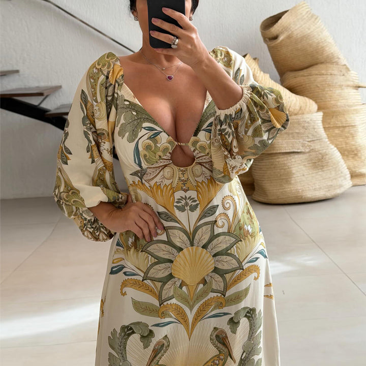 Ladies maxi dress with intricate floral design and deep V-neck