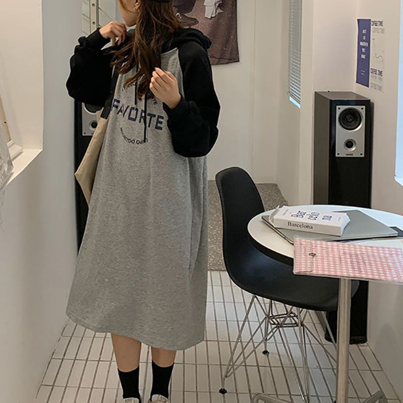 Women’s hoodie dress in casual oversized style with graphic print and side pockets