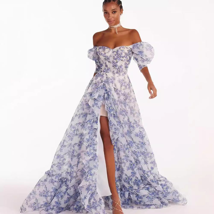 Women's festive maxi dress with off-shoulder design and floral ruffle details