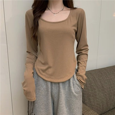 Women's long sleeve shirt with a stylish round neckline and fitted cut