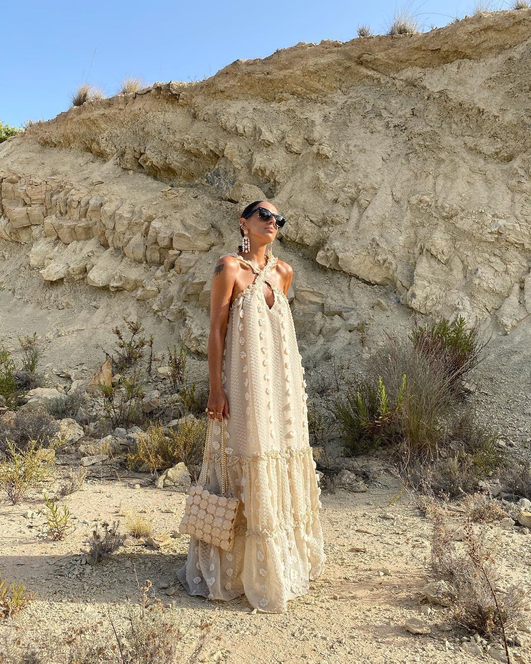 Women's maxi dress with playful ruffle details and floral pattern