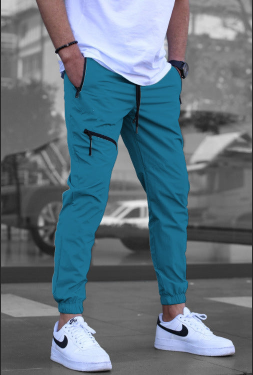 Men's sporty jogging pants with practical zip pockets and elastic waistband Lisslune