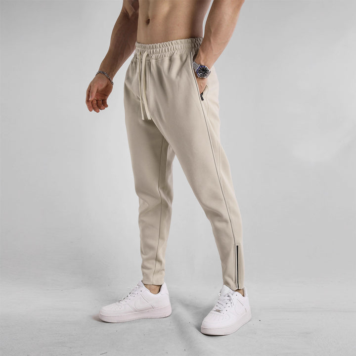 Men's sporty jogging pants with elastic waistband and side zip pockets Lisslune