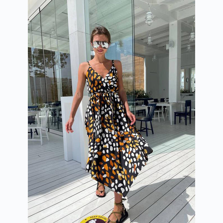 Women's maxi dress with elegant wrap design and stylish ruffle details