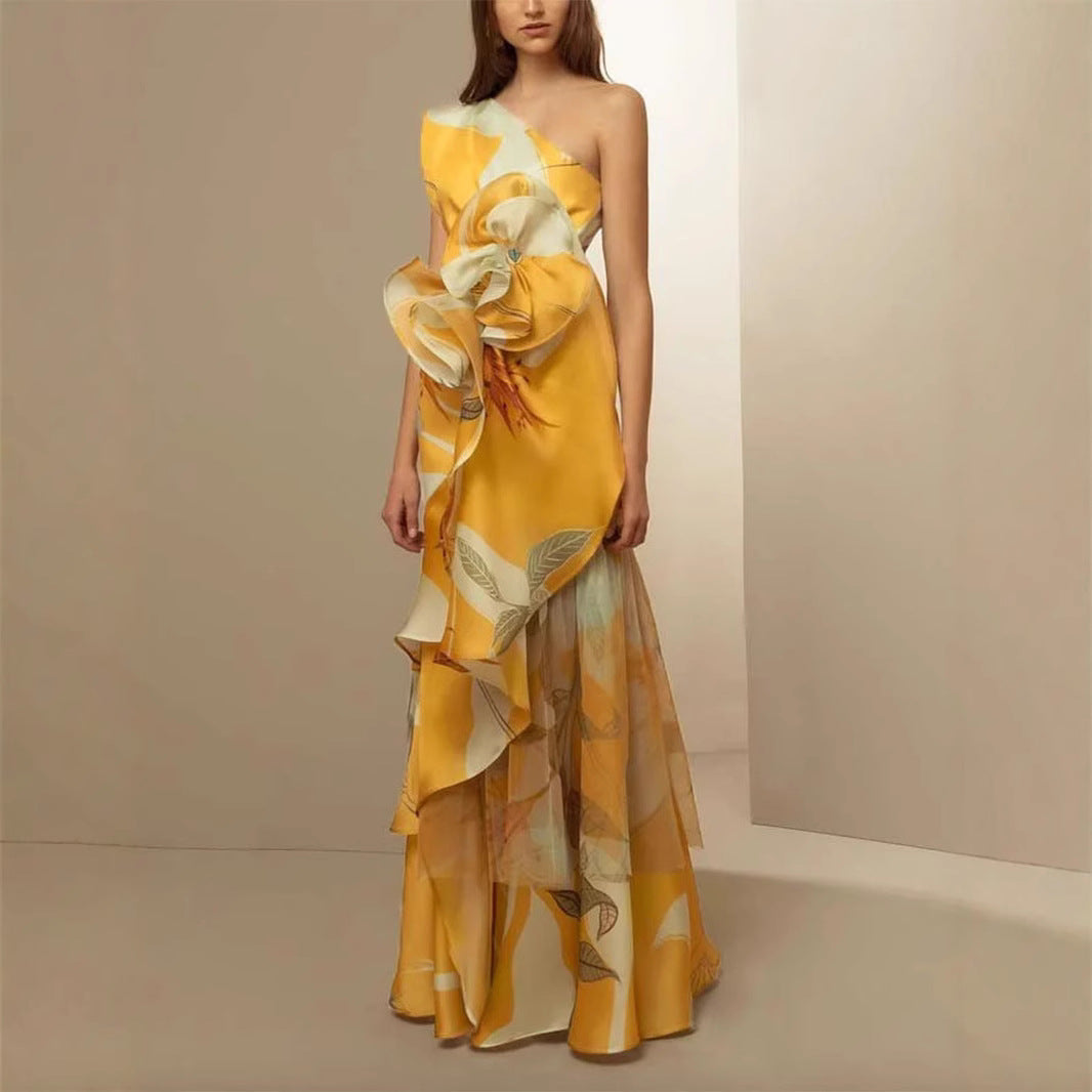 Women's elegant asymmetrical evening dress with flowing skirt and eye-catching ruffle details