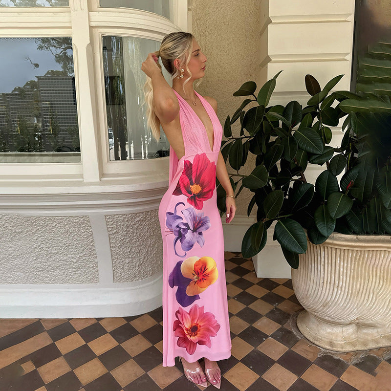 Ladies max dress with deep V-neckline and floral accents Lune London