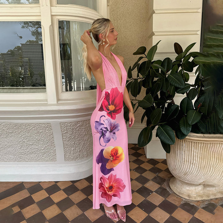 Ladies max dress with deep V-neckline and floral accents Lune London