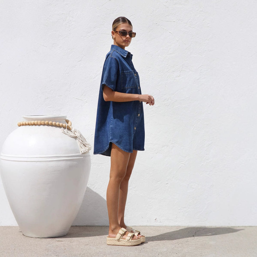 Women’s denim shirt dress with short sleeves and practical pockets