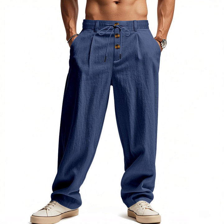 Men's casual loose-fitting leisure pants with elastic waistband and functional button details Lisslune