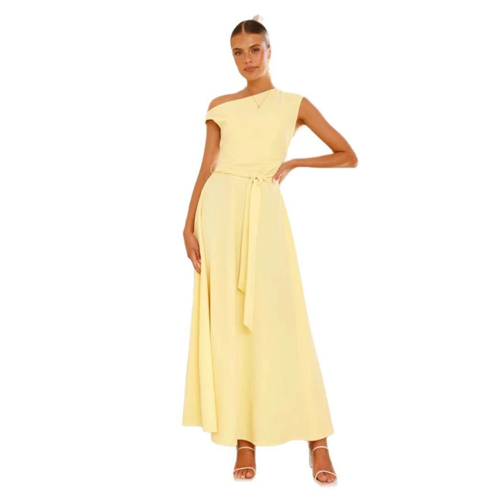 Women's maxi dress with a chic asymmetrical neckline and elegant bow