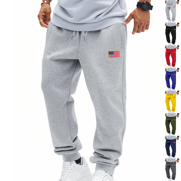 Men's sporty sweatpants with elastic waistband and practical side pockets Lisslune
