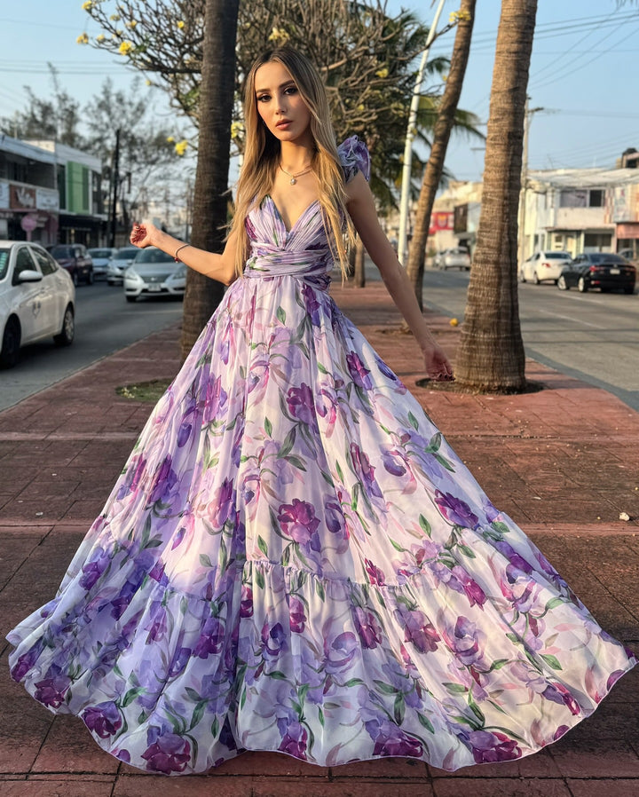 Women's maxi dress with airy ruffle details and extravagant wrap design
