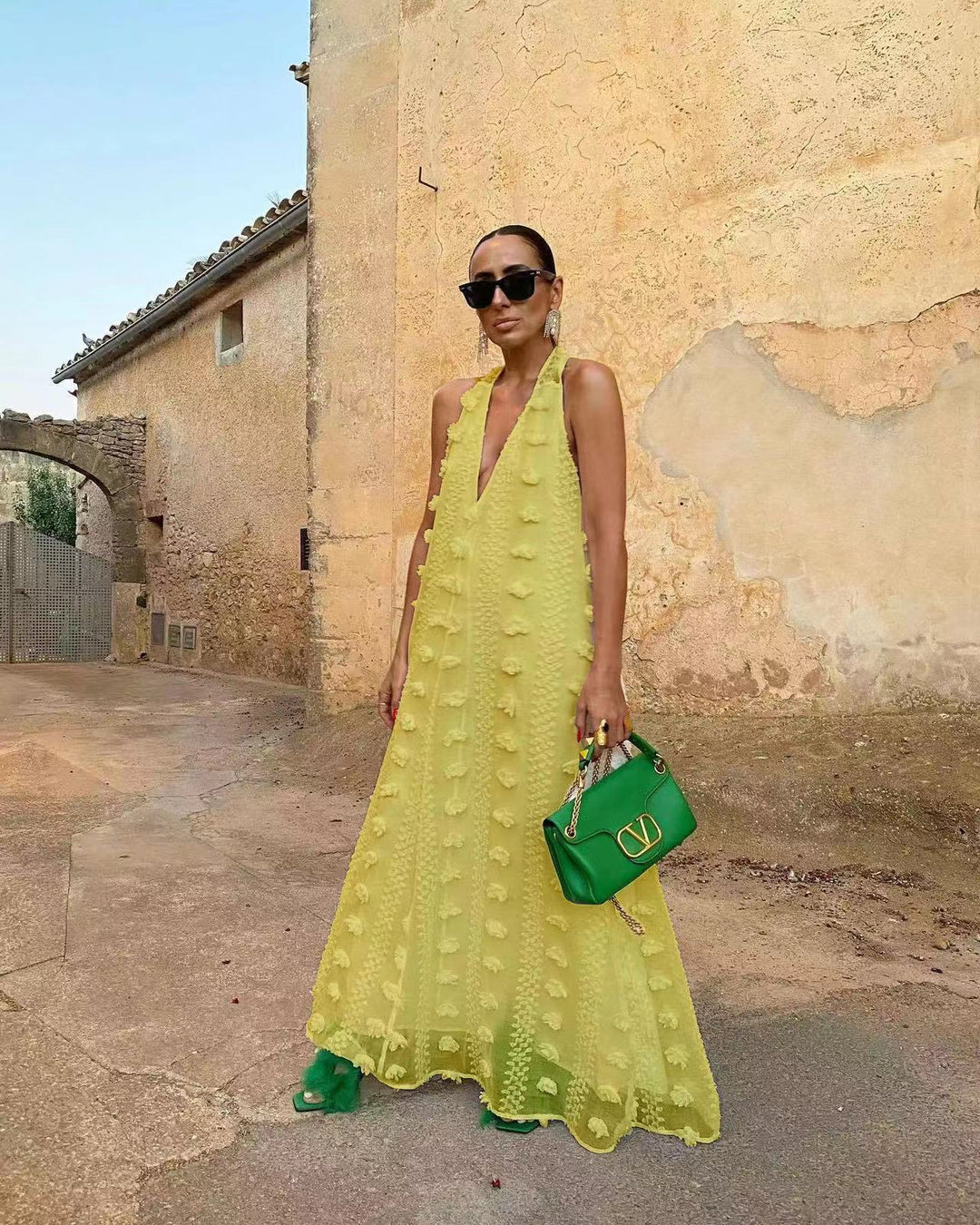 Women's maxi dress with 3D textures and deep V-neck