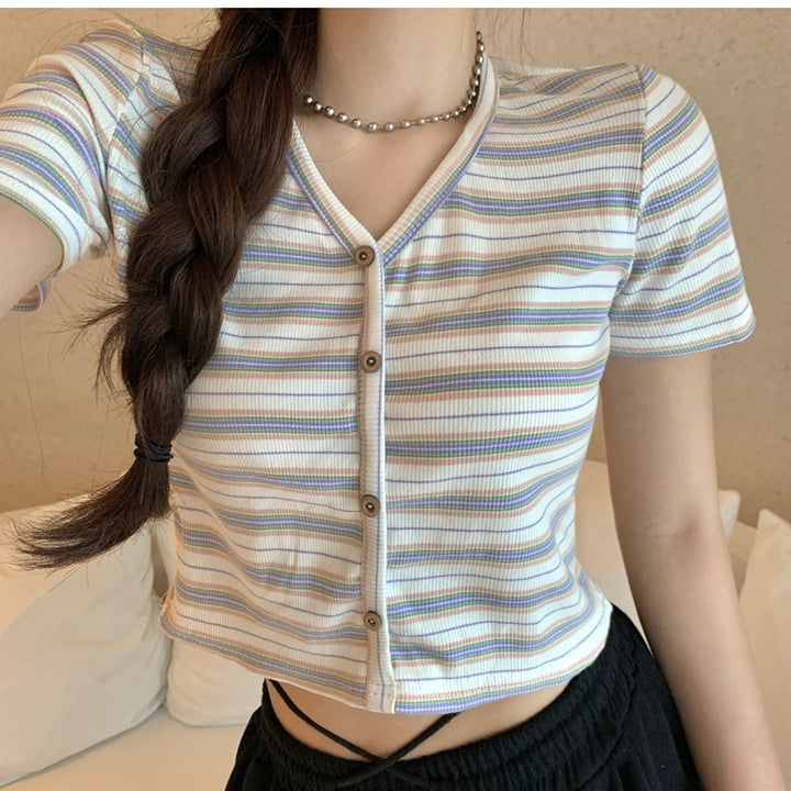 Women's cropped t-shirt with fashionable striped pattern and decorative buttons