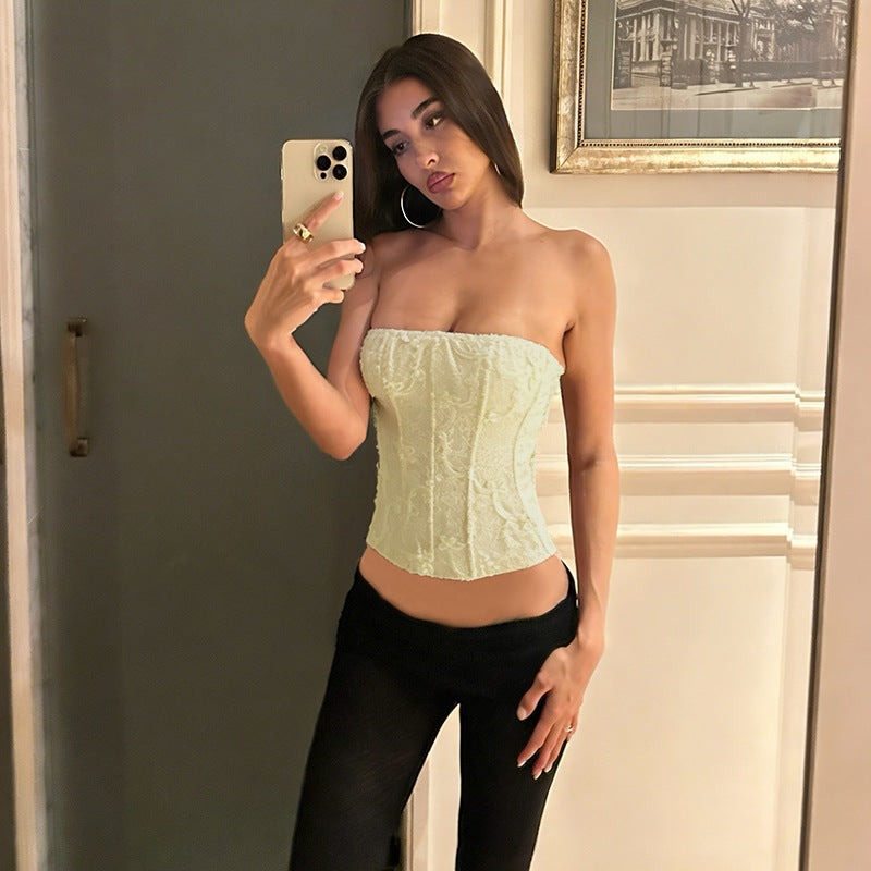 Women's corset top with intricate lace pattern and tailored fit