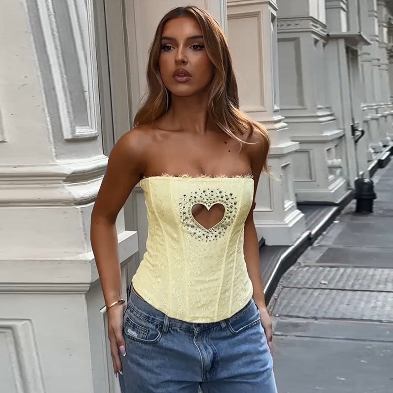 Women's bustier top with heart-shaped neckline and elegant rhinestone details