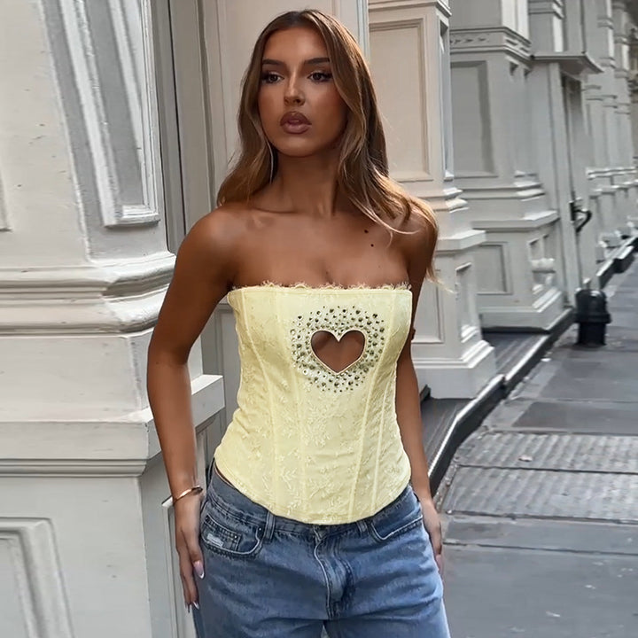 Women's bustier top with heart-shaped neckline and elegant rhinestone details